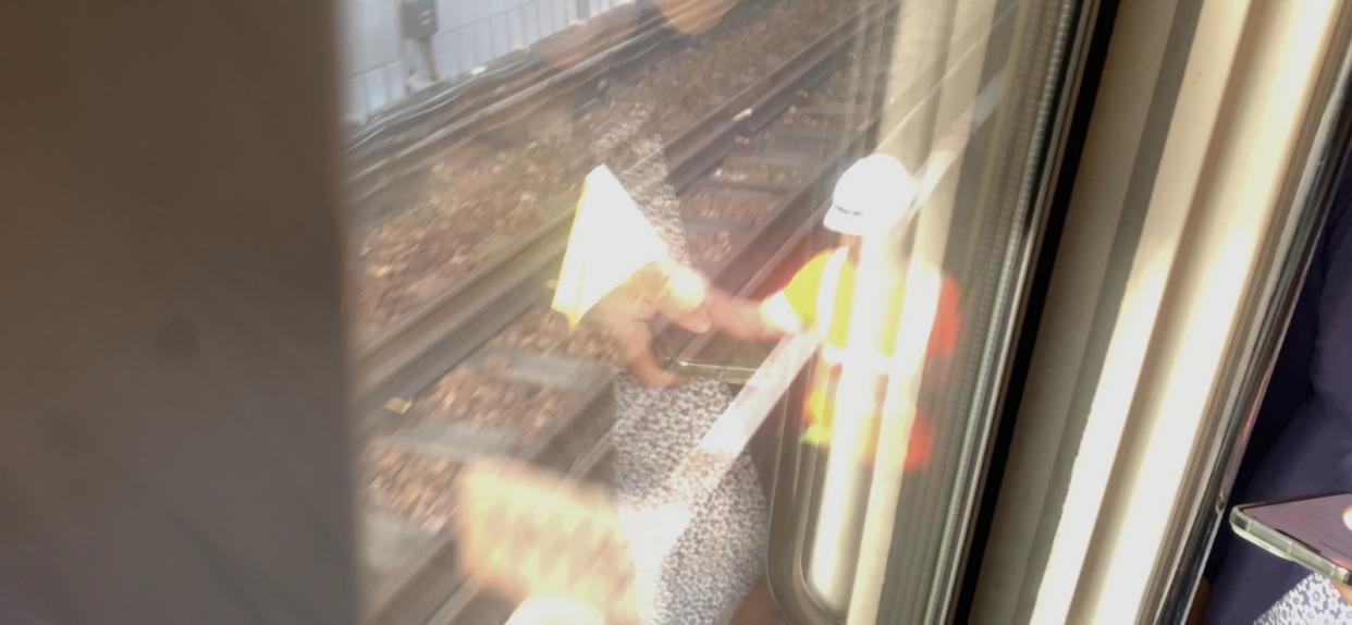 Trains must pass Admiralty crossover at not more than 10km/h due to a track point failure. At the affected crossover, P-way staff are using flags to control train movement. 