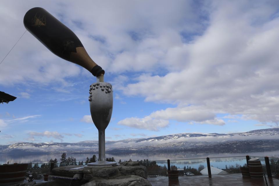 A giant wine bottle is displayed at the Summerhill Pyramid Winery in Kelowna, British Columbia, on Feb. 12, 2024. Home to more than 180 licensed grape wineries and known as “the wine capital of Canada,” the Okanagan Valley is also nationally renowned for fruit orchards that produce apples, peaches and cherries. (Aaron Hemens/IndigiNews via AP)