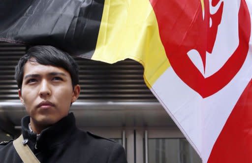 Bo Lomahquahu, France's sole native American Hopi descendant, poses in front of the Drouot auction house on April 12, 2013 in Paris, during the controversial auction of some 70 ceremonial sacred masks originating from the Hopi tribe of Arizona