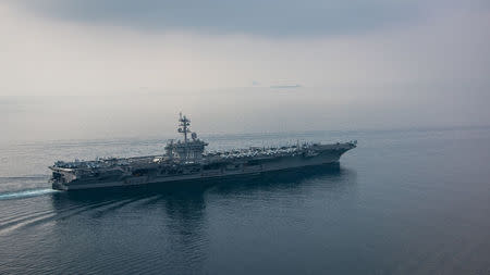 The aircraft carrier USS Carl Vinson (CVN 70) transits the Sunda Strait April 15, 2017. Picture taken April 15, 2017. U.S. Navy Photo by Mass Communication Specialist 2nd Class Sean M. Castellano/Handout via REUTERS