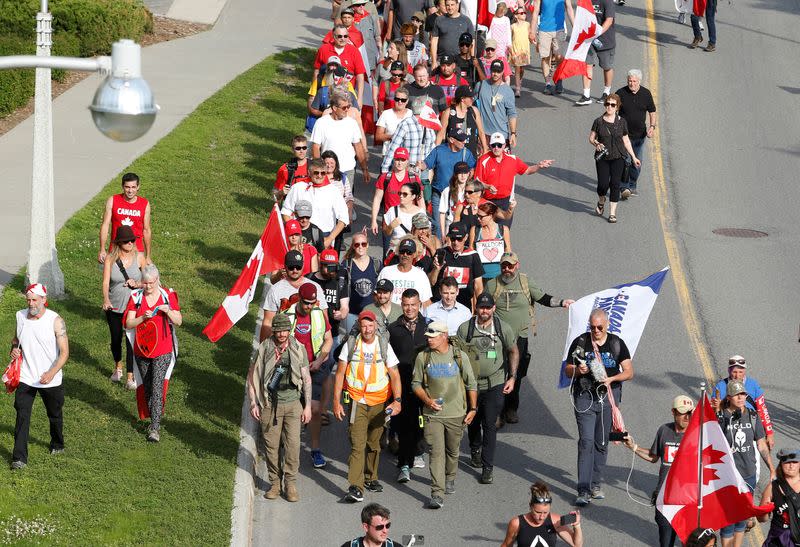 James Topp, a Canadian Forces veteran who marched across Canada protesting COVID-19 vaccines mandates, arrives at the National War Memorial