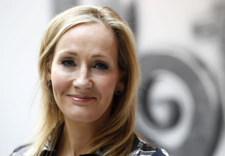 File photograph shows British writer JK Rowling, author of the Harry Potter series of books, posing during the launch of the new online website Pottermore in London June 23, 2011. REUTERS/Suzanne Plunkett/Files