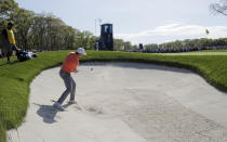 Jordan Spieth hits out of a bunker on the ninth hole during the third round of the PGA Championship golf tournament, Saturday, May 18, 2019, at Bethpage Black in Farmingdale, N.Y. (AP Photo/Julio Cortez)