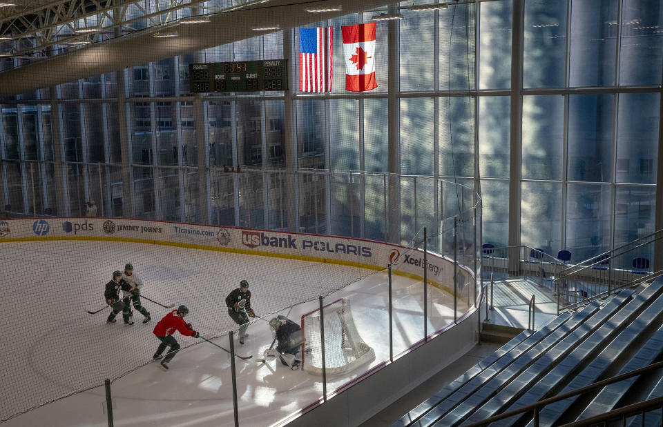 Minnesota Wild take to the ice during NHL hockey training camp Monday, Jan. 4, 2021, in St. Paul, Minn. (Elizabeth Flores/Star Tribune via AP)