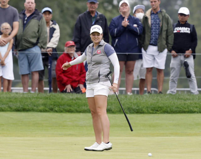 Ally Ewing reacts to her putt on the fifth green during the final round of the LPGA Tour Kroger Queen City Championship golf tournament in Cincinnati Sunday, Sept. 11, 2022. (AP Photo/Paul Vernon)