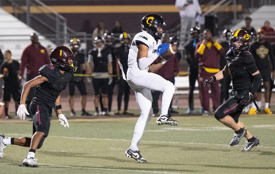 Gregori’s Trey Webb makes a reception during the Sac-Joaquin Section Football Division I playoff game with Gregori at Edison High School in Stockton, Calif., Friday, Nov. 3, 2023.