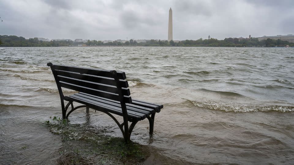 The Tidal Basin in Washington overflows the banks with the rain from Tropical Storm Ophelia on  Saturday. - J. David Ake/AP