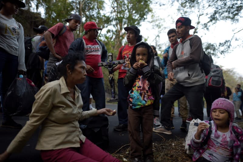 Hondurans take part in a caravan of migrants heading toward the U.S., in Chiquimula