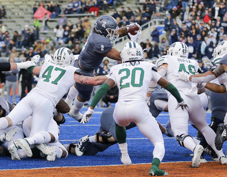 Nevada running back Devonte Lee (2) dives for the end zone during the second second half of the team's Famous Idaho Potato Bowl NCAA college football game against Ohio on Friday, Jan. 3, 2020, in Boise, Idaho. Lee was stopped short of the goal line. Ohio won 30-21. (AP Photo/Steve Conner)