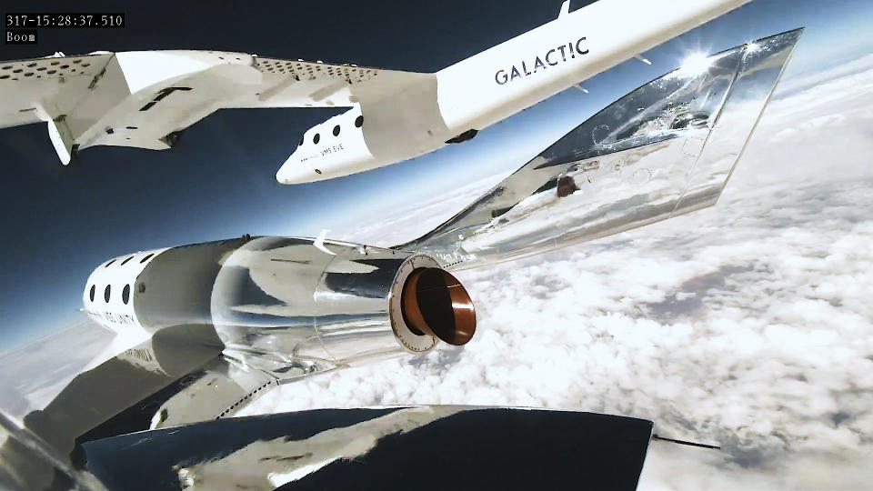 This Thursday, June 29, 2023, image provided by Virgin Galactic shows the Virgin Galactic's rocket-powered spaceplane during a research flight before gliding back down to Spaceport America in southern New Mexico. With the research flight complete, Virgin Galactic plans to begin commercial flights with paying ticket holders in August. (Virgin Galactic via AP)