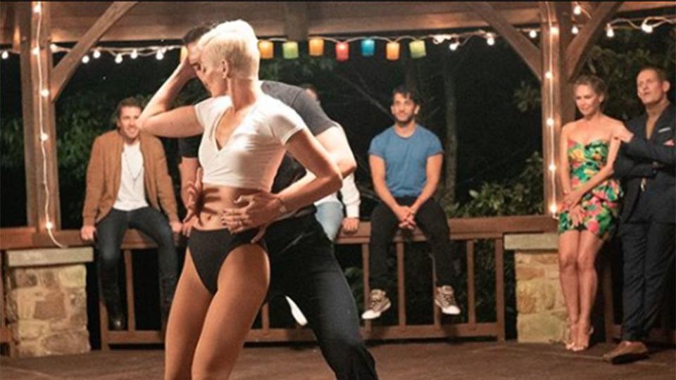 Jess Rowe (front) and Firass Dirani (blue shirt) on set of The Real Dirty Dancing in 2019.