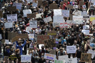 Demonstrators march for Justice in honor of George Floyd on Ashland Avenue Saturday, June 6, 2020, in Chicago. Demonstrators who gathered at Union Park marched through the city's West Side on Saturday afternoon, as the city prepared for another weekend of rallies. (AP Photo/Nam Y. Huh)