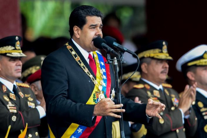 Venezuelan President Nicolas Maduro, an elected socialist, has blamed an 'economic war' caused by 'right-wing bosses' for the mass shortages in the country (AFP Photo/Federico Parra)