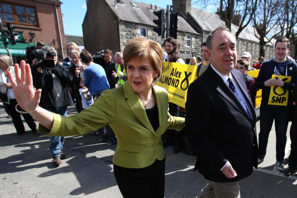 A file picture of Nicola Sturgeon with Alex Salmond while on the General Election campaign trail: PA