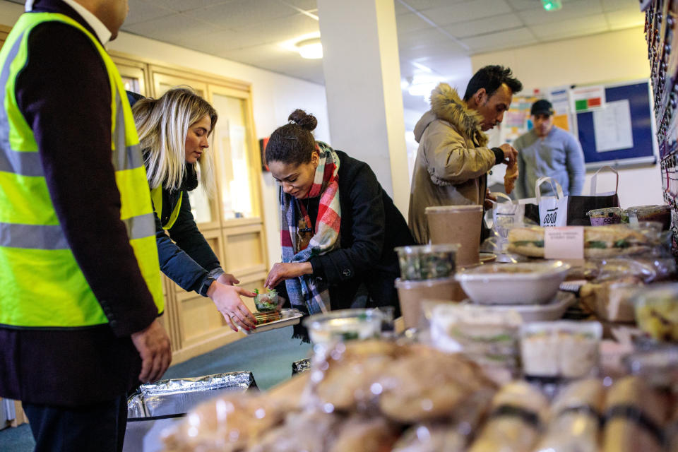 LONDON, ENGLAND - MARCH 05: Volunteers from food-waste charity The Felix Project, deliver surplus food collected from central London sandwich shops to a local shelter on March 5, 2019 in London, England. In 2018 the Food and Agriculture Organisation estimated that 2.2 million people in the UK are severely food-insecure, meaning that they lack reliable access to a sufficient quantity of affordable, nutritious food. The British Medical Journal reports this is the worst rate for a country in Europe, especially for children. In 2017 a House of Commons report estimated that 10 million tonnes of food and drink is wasted in the UK each year. The Felix Project is a charity, based in London that is trying to re-purpose waste food from supermarkets, food suppliers and cafes to organisations who feed people in need such as women's refuges, homeless charities, refugee centres, food banks as well as schools. The charity was named after the founder's son, Felix Byam Shaw, who died in 2014 from Meningitis. Looking for a way to commemorate his son, Justin Byam Shaw remembered Felix once being upset after learning that an opposing side of ten-year old boys at a football tournament he was competing in hadn't had any food that day. Out of this memory the charity grew into the operation it is today. A fleet of vans, driven by volunteers, collects surplus food from participating supermarkets and cafes in London which is then either taken to a warehouse along with other donations from food suppliers or delivered directly to the organisations in need, providing nearly three million meals per year. (Photo by Jack Taylor/Getty Images)