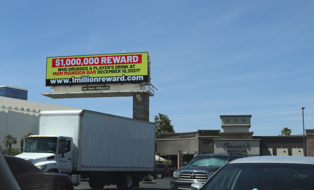 Pictured is a billboard in Las Vegas, Nevada offering $1 million for anyone with information leading to the arrest or conviction of the person who drugged Southern California real estate developer Dwight Manley at MGM Grand on Dec. 10, 2021.