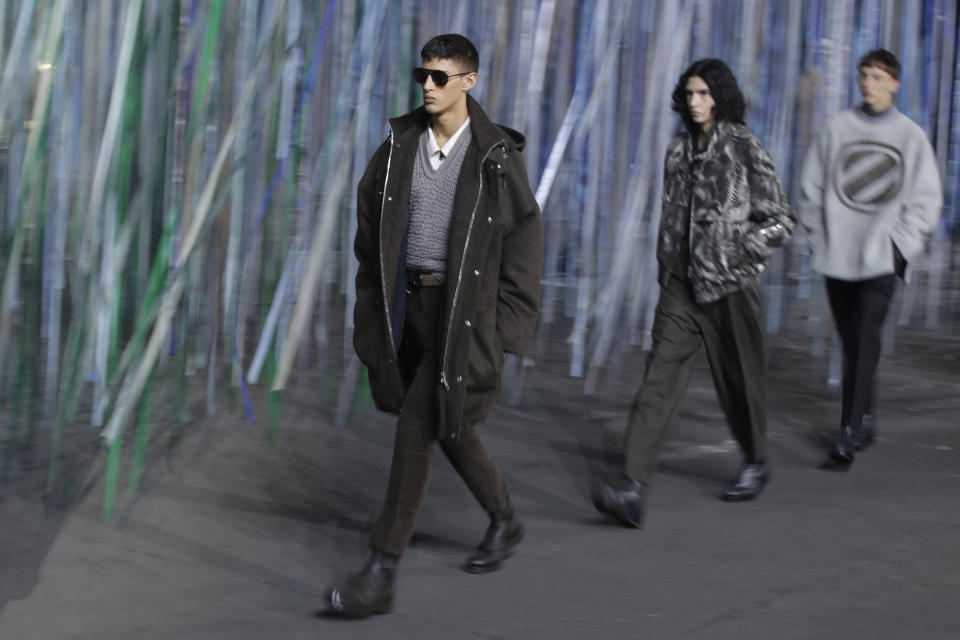 Models wear creations as part of the Ermenegildo Zegna men's Fall-Winter 2020/21 collection, that was presented in Milan, Italy, Friday, Jan. 10, 2019. (AP Photo/Luca Bruno)