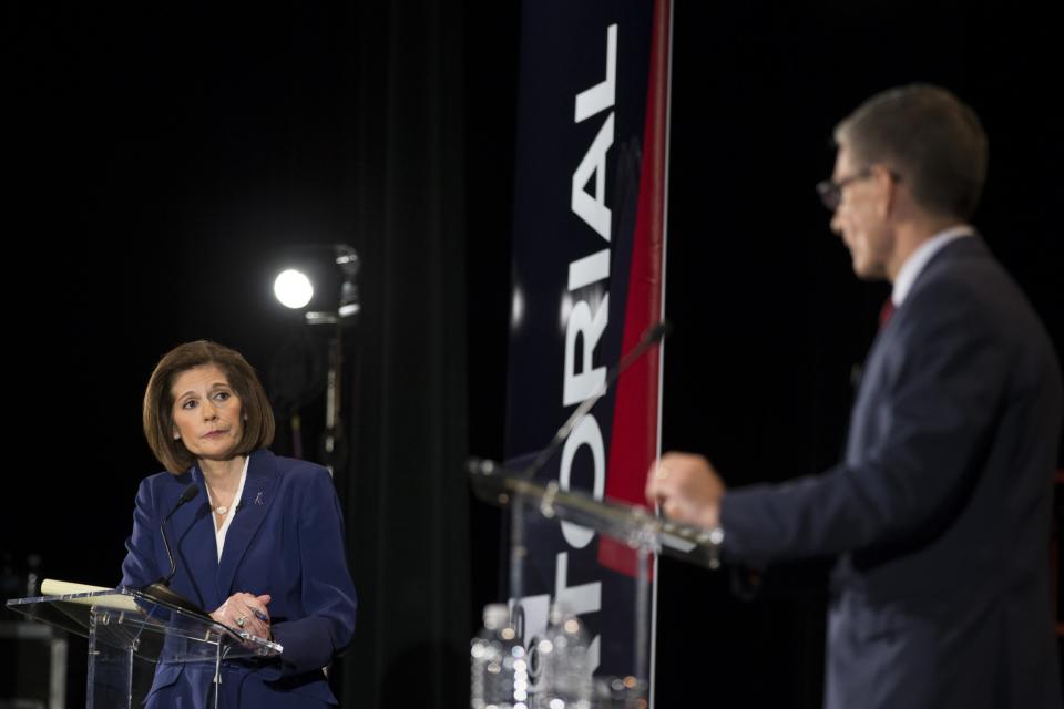 Democratic Senate candidate Catherine Cortez Masto listens to U.S. Rep. Joe Heck during the Nevada Senatorial Debate at Canyon Springs High School on Friday, Oct. 14, 2016, in North Las Vegas, Nev. (Photo: Erik Verduzco/Las Vegas Review-Journal via AP)