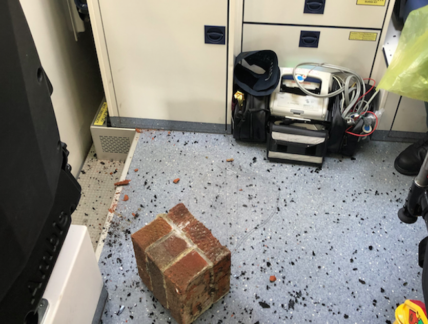 Bricks were thrown into an ambulance in one of the alleged attacks (NEAS)