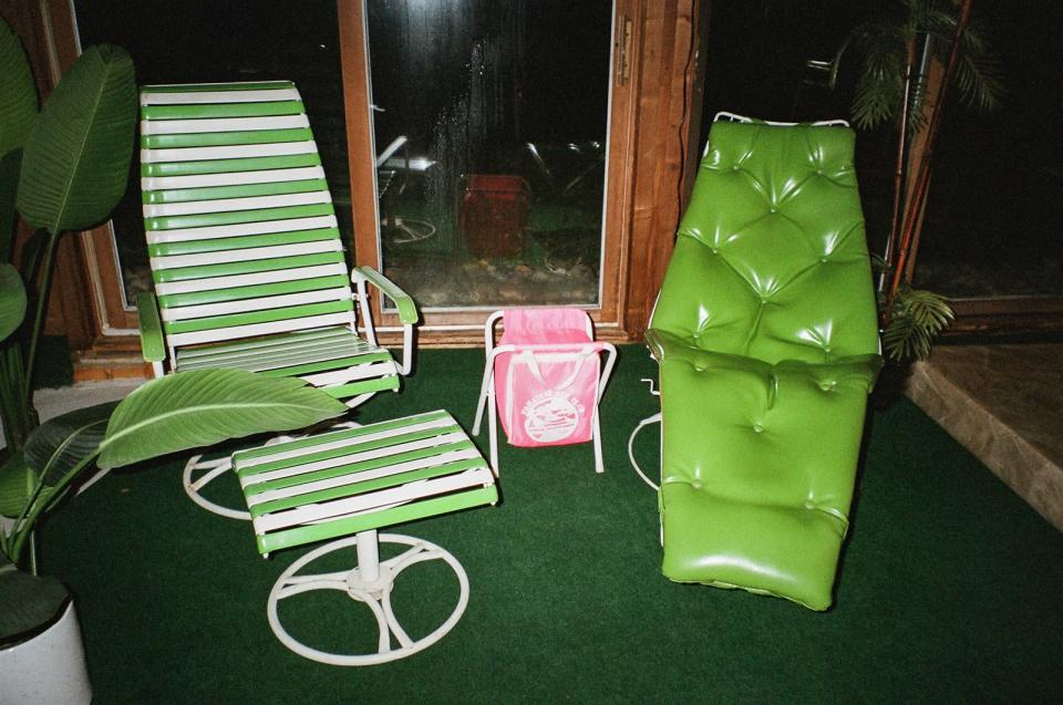 The green vinyl chair was one of her first finds for the home &#x002014; and at $300, a bit of a splurge. &#x00201c;It was like, I don&#x002019;t know if this house is going to pan out, but people just love this chair. That was a good investment,&#x00201d; she says.