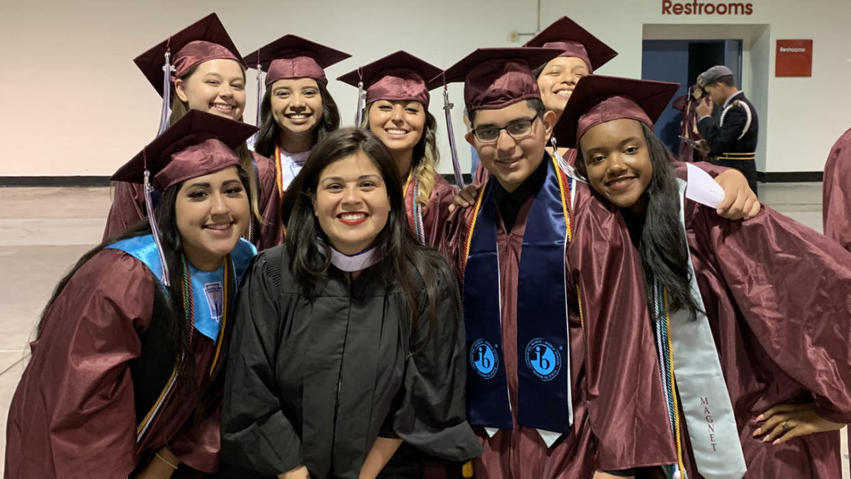 Elizabeth Santos with her graduating class.