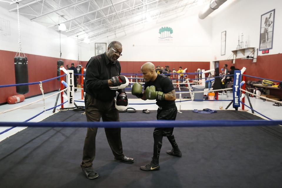 Boxer Jamie Walker of Columbus trains with coach Vonzell Johnson at the Douglas Community Center in Linden on Feb. 21, 2019.