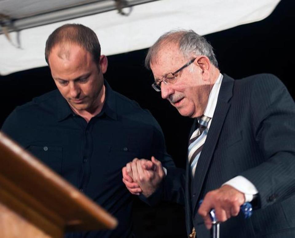 Don Ryce, the father of Jimmy Ryce, is helped by his son Ted Ryce, left, as they speak following the 2014 execution of Jimmy’s murderer Juan Carlos Chavez.