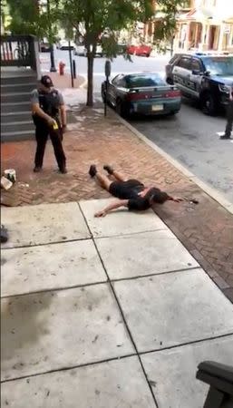 A man spreads his arms after getting Tasered by a police officer, in Lancaster, Pennsylvania, U.S., June 28, 2018, in this still image taken from a video obtained from social media. MANDATORY CREDIT. Jay Jay/via REUTERS