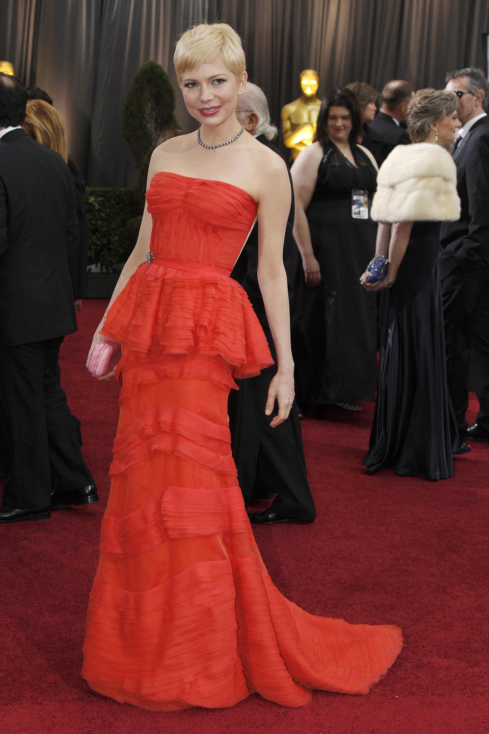 Michelle Williams arrives before the 84th Academy Awards on Sunday, Feb. 26, 2012, in the Hollywood section of Los Angeles. (AP Photo/Amy Sancetta)
