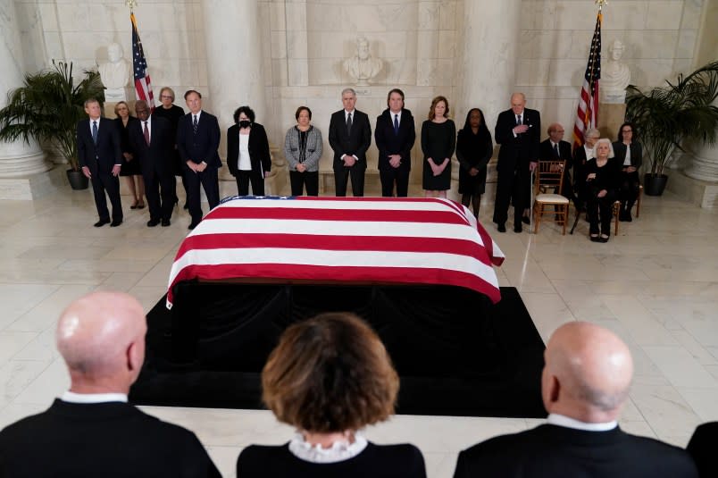 WASHINGTON, DC – DECEMBER 18: With family members in the foreground, in the back from left, Chief Justice of the United States John Roberts, Justice Clarence Thomas, Justice Samuel Alito, Justice Sonia Sotomayor Justice Elena Kagan, Justice Neil Gorsuch, Justice Brett Kavanaugh, Justice Amy Coney Barrett, Justice Ketanji Brown Jackson and retired Justice Anthony Kennedy, stand in front flag-draped casket of retired Supreme Court Justice Sandra Day O’Connor during a private service in the Great Hall at the Supreme Court on December 18, 2023 in Washington, DC. O’Connor, the first woman appointed to be a justice on the U.S. Supreme Court, died at 93 on December 1. (Photo by Jacquelyn Martin-Pool/Getty Images)