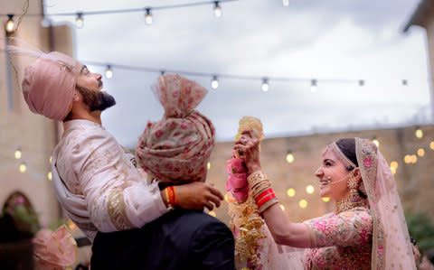 The Indian cricket captain and the Bollywood actress got married in Italy on December 11, ending weeks of frenzied speculation - Credit:  AFP