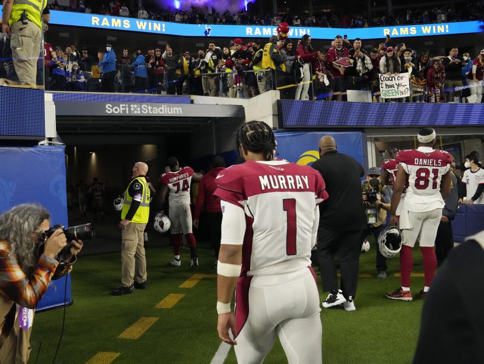 Arizona Cardinals quarterback Kyler Murray (1) walks off the field after losing 34-11 against the Los Angeles Rams in the NFC Wild Card playoff game.