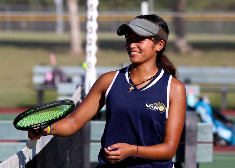 Hayden's Ainzley Zulueta smiles during the Topeka City Championship on Thursday, Sept. 26.