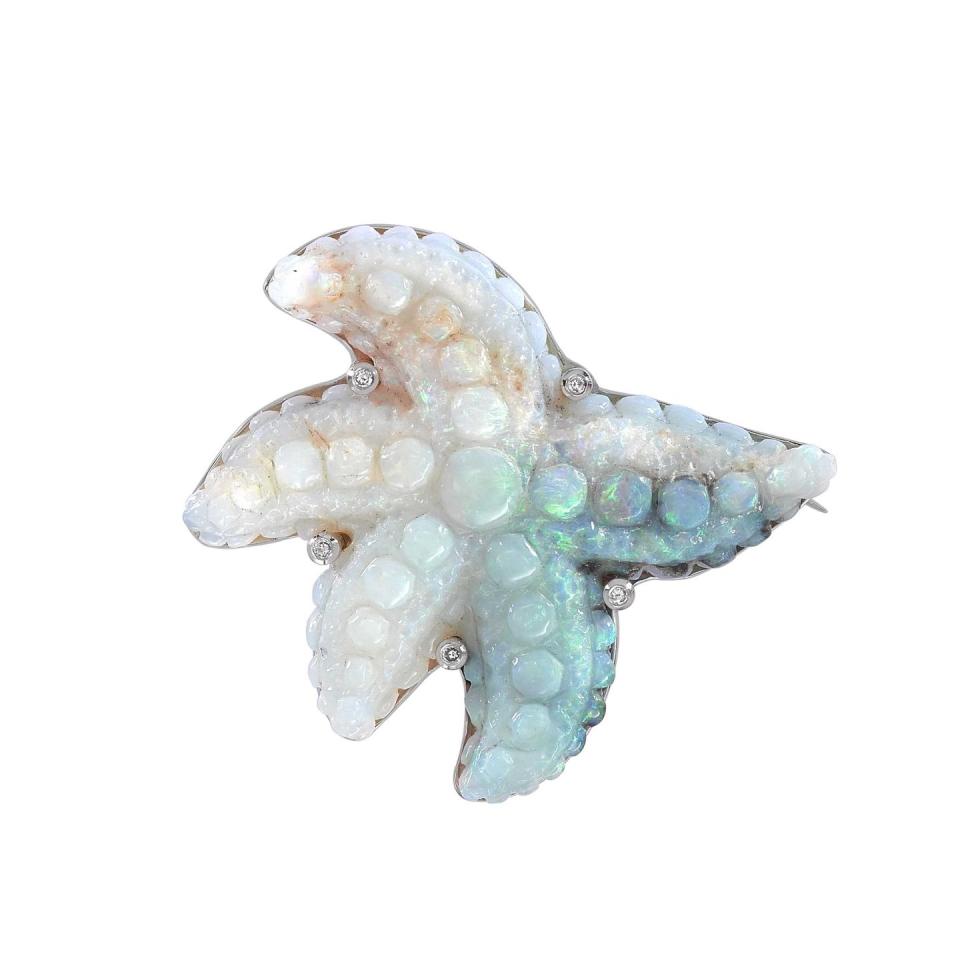 <p>Evoke the ocean with this brooch, crafted from glowing opal – a stone said to boost feelings of self worth.</p><p>White gold, diamond and opal brooch, £10,250, Theo Fennell </p><p><a class="link " href="https://www.theofennell.com/product/opal-carved-starfish-brooch" rel="nofollow noopener" target="_blank" data-ylk="slk:SHOP NOW;elm:context_link;itc:0;sec:content-canvas">SHOP NOW </a></p>