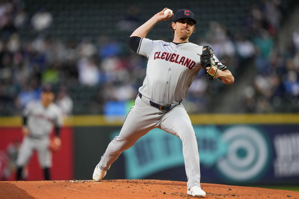 Cleveland Guardians starting pitcher Shane Bieber throws against the Seattle Mariners during the first inning of a baseball game Tuesday, April 2, 2024, in Seattle. (AP Photo/Lindsey Wasson)