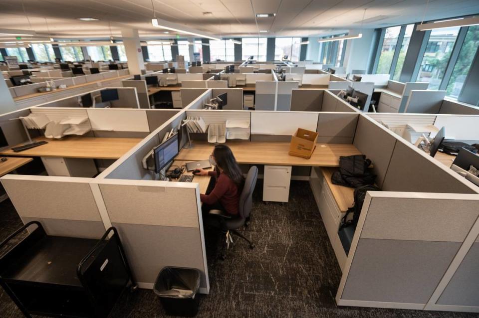 California Energy Commission manager Patricia Carlos works inside of the California Natural Resources Building on Friday, Nov. 19, 2021, in Sacramento. Carlos works from the building one to two days per week.