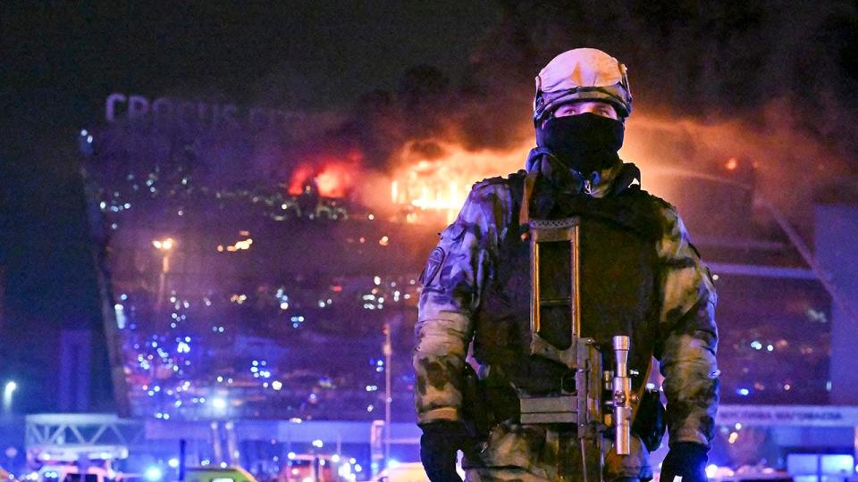 A fire fighter in front of the concert hall