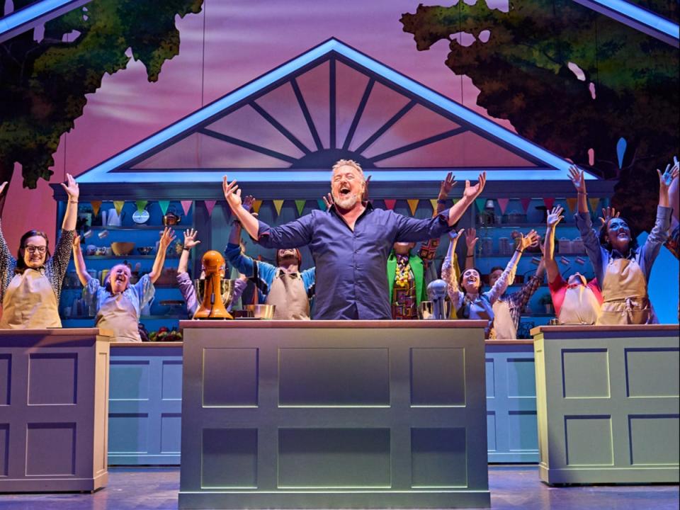 John Owen-Jones as Phil Hollinghurst and the cast of ‘The Great British Bake Off Musical' (Handout)