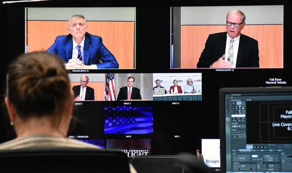 Fall River mayoral candidates Sam Sutter, left, and Mayor Paul Coogan are seen in the Fall River Community Media control room at Bristol Community College during their debate on Thursday, Oct. 12