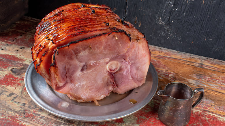 Baked ham on table