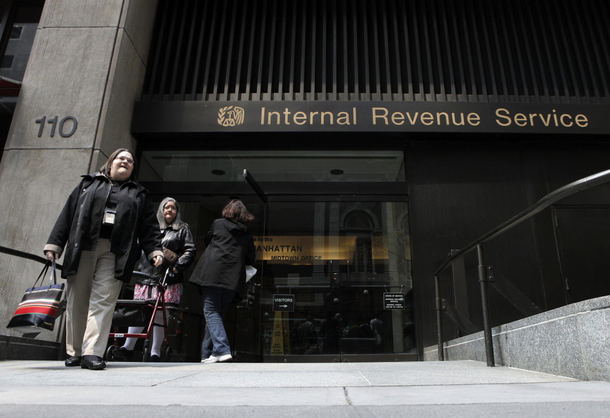 Women walk out of an Internal Revenue Service office in New York. (Credit: Lucas Jackson, REUTERS) 