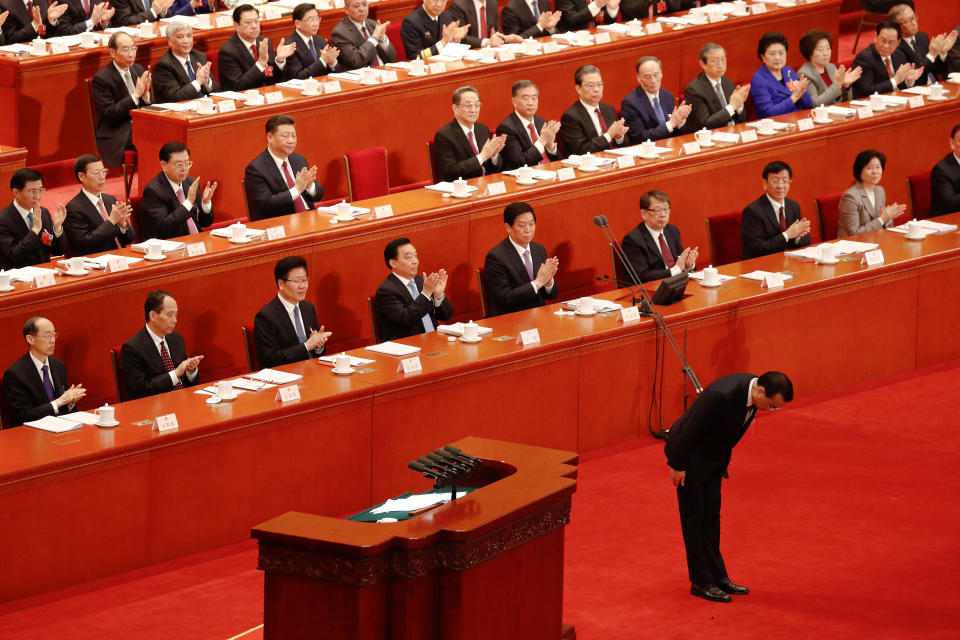 <p>Chinese Premier Li Keqiang bows after delivering his speech during the opening session of the National People’s Congress (NPC) at the Great Hall of the People in Beijing on March 5, 2018. (Photo: Damir Sagolj/Reuters) </p>