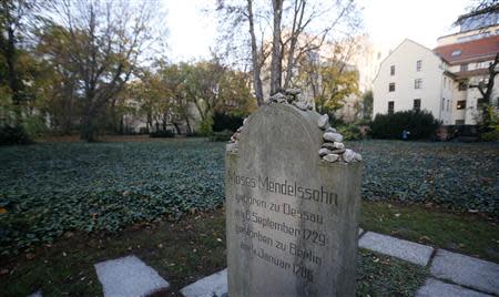 The gravestone of German philosopher Moses Mendelssohn is seen beside the site of the mass grave at Grosse Hamburger Strasse Jewish cemetery in Berlin, October 31, 2013. REUTERS/Fabrizio Bensch