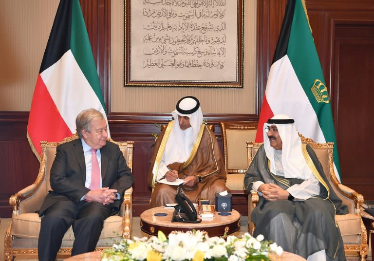 A Kuwaiti news agency photo shows a meeting between the Kuwaiti emir and the UN chief (-)