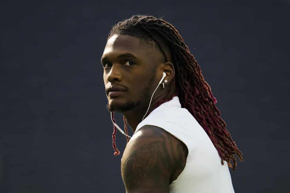 Dallas Cowboys wide receiver CeeDee Lamb warms up before an NFL football game against the Los Angeles Chargers Wednesday, Oct. 18, 2023, in Inglewood, Calif. (AP Photo/Ashley Landis)