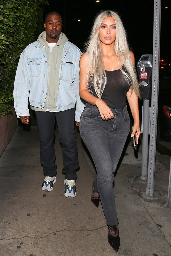 <p>Kim and Kanye had a date night in Santa Monica. The reality star stayed mum when asked about her booming family. Kimye’s surrogate is reportedly pregnant, as are sisters <a rel="nofollow" href="https://www.yahoo.com/celebrity/khloe-kardashian-pregnant-expecting-first-child-tristan-thompson-232038378.html" data-ylk="slk:Kylie;elm:context_link;itc:0;sec:content-canvas;outcm:mb_qualified_link;_E:mb_qualified_link;ct:story;" class="link  yahoo-link">Kylie</a> and <a rel="nofollow" href="https://www.yahoo.com/beauty/khloe-kardashians-journey-motherhood-225228169.html" data-ylk="slk:Khloé;elm:context_link;itc:0;sec:content-canvas;outcm:mb_qualified_link;_E:mb_qualified_link;ct:story;" class="link  yahoo-link">Khloé</a>. <em>Keeping Up With the Kardashians</em>, indeed. (Photo: Maciel/Backgrid) </p>