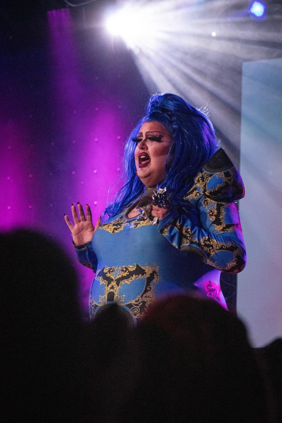 Mia Gunn Mornett "belts" out a line while lip-syncing during her performance at Martha's Vineyard on Friday, Feb. 11, 2022. Mornett has been performing drag for 10 years in Springfield. Today, she both performs as a drag queen on Martha's stage and DJs weekday shows.