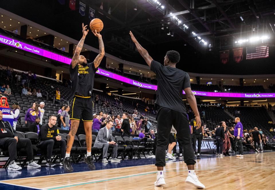 Los Angeles Lakers guard D'Angelo Russell takes a shot while warming up before their preseason game Thursday at Acrisure Arena in Palm Desert.