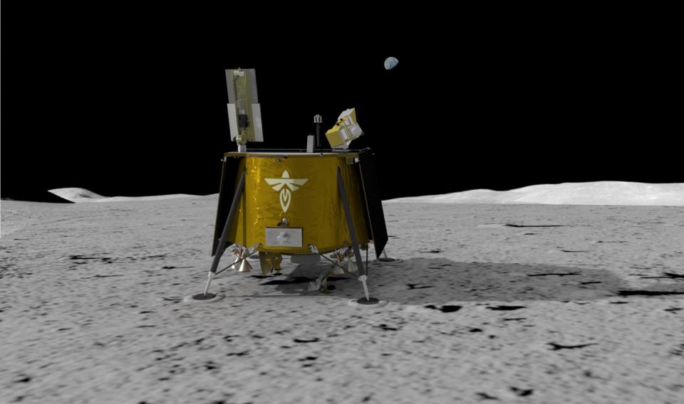 a squat, roughly cube-shaped spaceship wrapped in gold foil sits on the surface of the moon