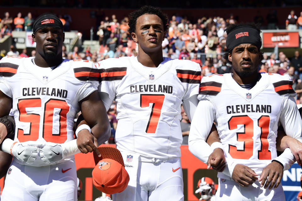 <p>B.J. Bello #50 of the Cleveland Browns DeShone Kizer #7 of the Cleveland Browns Reggie Porter #31 of the Cleveland Browns stand arm in arm durning the National Anthem before the game against the Cincinnati Bengals at FirstEnergy Stadium on October 1, 2017 in Cleveland, Ohio. (Photo by Jason Miller /Getty Images) </p>